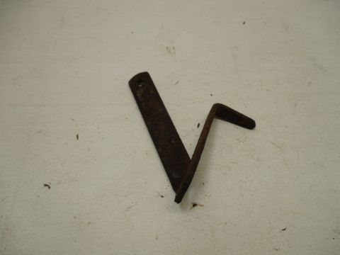 Throttle return spring bracket