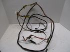 Wiring harness for seat belt interlock
