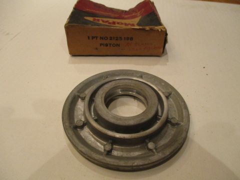 Transmission rear clutch piston
