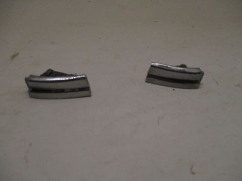Lower fender peak inner mouldings, pair