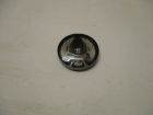 Interior door assist handle medallion