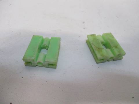 Pair of steering column plastic slide spacers