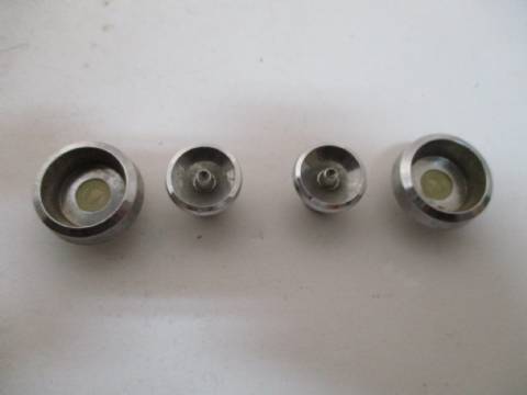 Set of four radio knobs