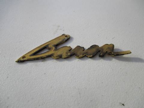 Front fender nameplate backing