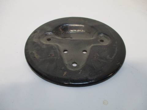 Fuel filler door medallion backing