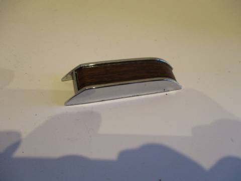 Door assist strap woodgrain screw cover
