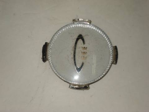 1964 New Yorker hubcap center