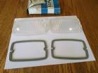 Pair of parking light lenses and gaskets